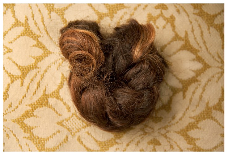 When I turned 7 years old I asked my mom to cut my hair. I remember her crying while braiding it to finally use the scissors. After that she kept the braid in a shoe box. 